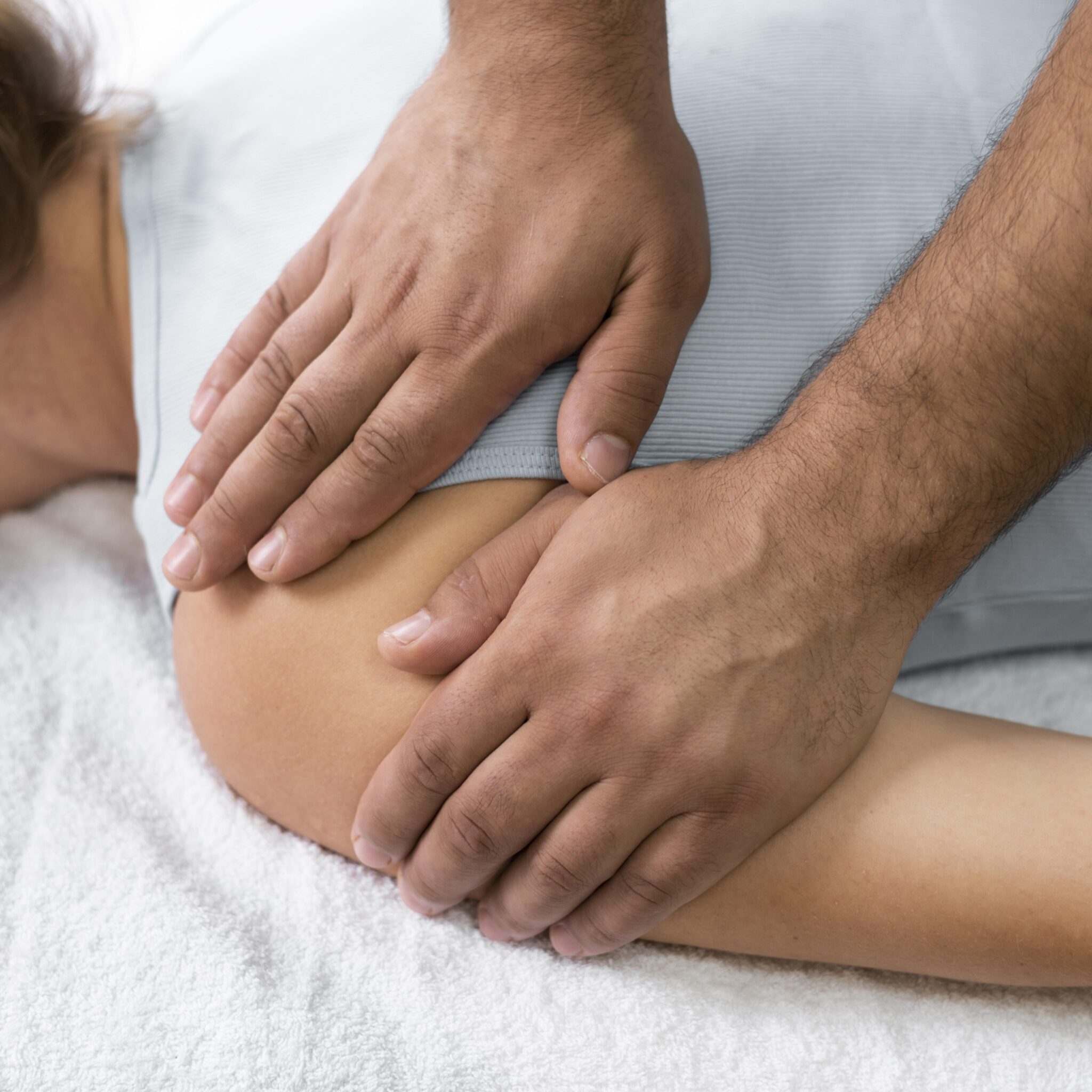 osteopathy-patoient-getting-tretment-massage-edited-2048x2048