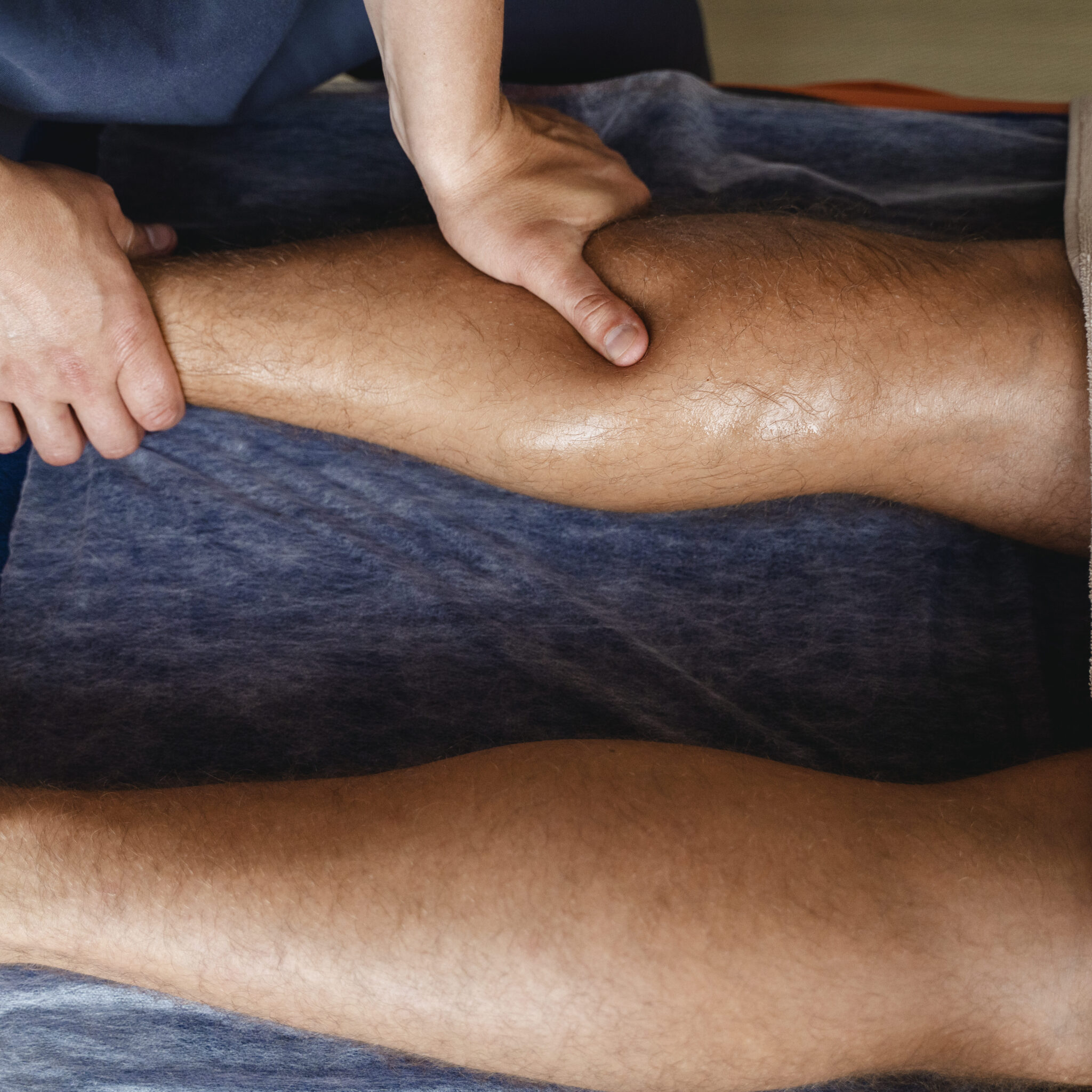 top-view-man-massaging-patient-edited-2048x2048